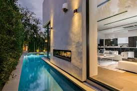 Maybe you would like to learn more about one of these? 7 Reasons To Stand In Awe Of The Indoor Outdoor See Through Fireplace