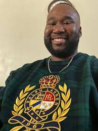 Teddy bear sweatshirt and plaid vest outfit