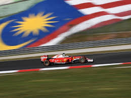 Just in case sebastian vettel wasn't really sure that he was not wanted at ferrari, it appears they have removed his name from his scuderia jacket. F1 Reader Vettel These Hot Conditions Suit Us