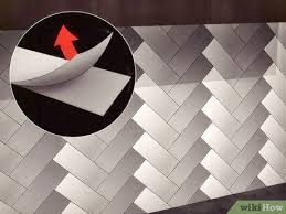Typical glass, metal, ceramic, and stone backsplash installations require mortar, spacers, and grout as well as installation experience. 4 Ways To Install A Tin Tile Backsplash Wikihow