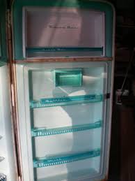 The tub started filling with water & i left. Philco Fridge