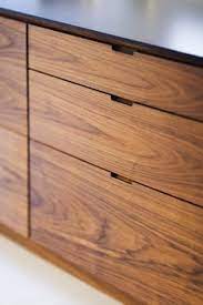 Wooden Furniture Handles Google Search Kitchen Design Trends Kitchen Cabinets Without Handles Modern Kitchen Design