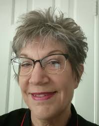 Should I continue growing my hair or leave it short?