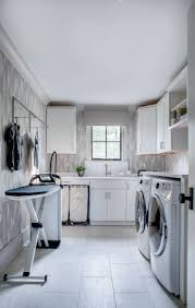 Finishing the room with a wooden counter for folding laundry ties the room together nicely. 30 Best Laundry Rooms Lovely Functional Laundry Room Ideas