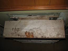 Removing the screws should allow you to remove the baseboard heater. Old Wall Heater How To Remove The Surround For Outdoors Section Of Exhaust Flue Heating Help The Wall