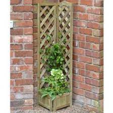 Garden netting, cucumber trellis netting saves garden space size: Corner Trellis Planter Planters At Greatlittlegarden Co Uk
