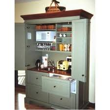 Pin By Sheri Roach On Home Armoire Amore Kitchen Armoire Kitchen Design Companies Armoire Pantry