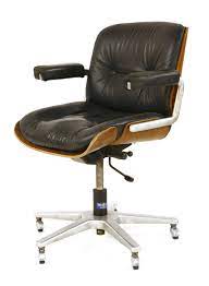 Eames aluminum group management chair. Lot 354 An Eames Style Revolving Desk Chair
