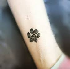 Man's best friend has finally found a fitting tribute. 47 Tiny Paw Print Tattoos For Cat And Dog Lovers Revelist