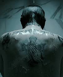 The tattoo that can be seen on the back of a popular fictional movie character named john wick, who is played via actor keanu reeves, is known as 'fortis fortuna adiuvat'. Bad Habits Of Tattoo Artists John Wick Tattoo Special Sunday John Wick Tattoo Keanu Reeves John Wick Tattoo John Wick