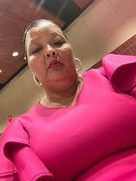 I enjoy how Ruth-Anne expresses her personality with her cute sweatshirts,  tops, sweaters and her lovely pink dress.