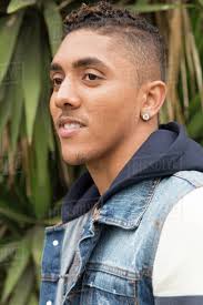 Find the most popular men's haircuts and the best men's hairstyles to try. Portrait Of Pensive Mixed Race Man Stock Photo Dissolve
