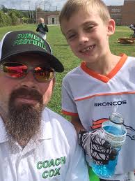 Can the football being held in front of my sons face be removed???