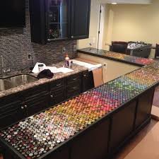 6 Projects To Justify Hoarding Your Bottle Caps Make Custom Bottle Caps Bottle Cap Projects Bottle Cap Table