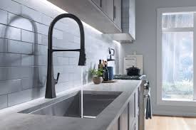 It is composite grante, drop in to a laminate. Kitchen Faucet Combines Bold Design Connective Technology Qualified Remodeler
