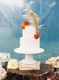 Wedding cake with buttercream white roses ideas. Beautiful Buttercream Wedding Cakes Martha Stewart