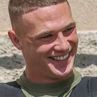 Corporal Dalton Kirkey from Lansing, Mich., a financial