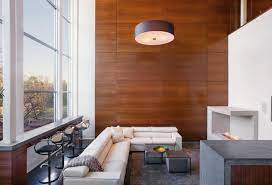 In the photo above, a narrow area of paneling surrounded by white walls actually helps the space look. 20 Rooms With Modern Wood Paneling