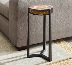 It features a round glass top with a colorful flower and hummingbird design. Cori Glass Accent Side Table Pottery Barn
