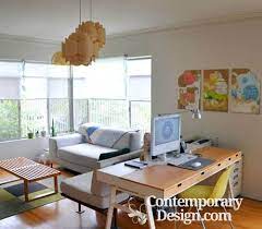 A corner in your living room or dining room can make a great small home office ideas like this one take on a life of their own when designed with a cool theme. Home Office In Living Room Contemporary Design Living Room Office Combo Living Room Office Small Room Design