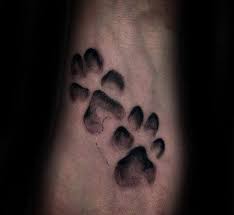 There is no better way to celebrate your furry friend than with a tattoo of their adorable paw prints! Top 69 Dog Paw Tattoo Ideas 2021 Inspiration Guide