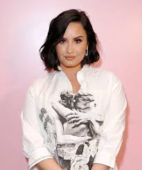 Demi lovato, a longtime advocate of body positivity and acceptance, who battled an eating disorder for years, shared photos of her stretch marks adorned with glitter over the christmas holiday. Who Is Demi Lovato Dating Now In 2020 Love Life Update