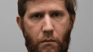 Tennessee teacher who admitted to filming students in locker room cries in  court