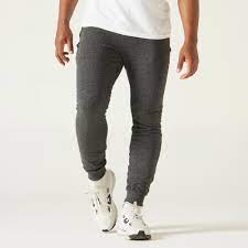 Il y a un cordon à la taille pour le resserrer. Pantalon Jogging Fitness Slim Poches Zippees Nyamba Decathlon