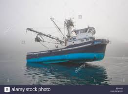 alaska, kodiak. a boat sinks after