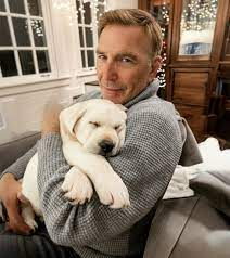 Yellowstone - Kevin Costner just introduced the newest member of his crew—a  snow-white Lab puppy. “Newest addition to the family. I'm already in love  with this special guy.” Quiet photos, soft grin,