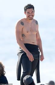 Maybe you would like to learn more about one of these? Freedomroo Henry Golding Enjoys Surf Session As Pregnant Wife Liv Lo Lounges On The Beach In Santa Monica Australiannewsreview