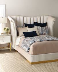 Storage drawers open on each side, revealing ample space to store clothes and bedding. White Upholstered Bed Neiman Marcus