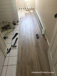 In order to install a solid floor one would need a proper subfloor. Ideas For Covering Up Tile Floors Without Removing It The Decor Formula