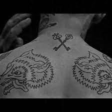 Wolf Key Tattoos From The Music Video Iron By Woodkid Neck Tattoo Tattoos Key Tattoos