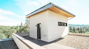 Built To The Passive House Standard The Super Energy Efficient House Features Triple Pane Windows Exter Design Build Firm Building Design Exterior Insulation