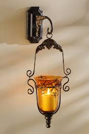 From creative wall plaques to unique wall mirrors, you can find affordable wall decor to upgrade any room in your home. Kirklands Pin It Pretty Glam Up Any Wall With This Amber Metal Sconce Kirklands Glam Chic Pinitpretty Wall Candles Candles Sconces