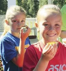 Doughnut seeds, rabbit's milk and pig's feet — Oh, my! Third graders gain  Farm to Plate education