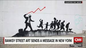 His satirical street art and subversive epigrams combine dark humour with graffiti executed in a distinctive. Banksy Street Art Sends A Message In Nyc Cnn Video