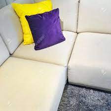 Maybe you would like to learn more about one of these? White Corner Sofa With Yellow And Purple Cushions Modern Design Stock Photo Picture And Royalty Free Image Image 51436863
