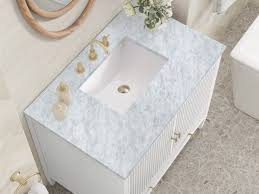 The Timeless Elegance of a White Bathroom Vanity with Carrara ...