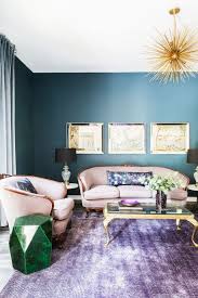 A lot of design decisions and combinations of the living room is characterized by calm shades in the interior; A Color Rich Home That Will Brighten Your Day Teal Walls Living Room Jewel Tone Living Room Decor Gold Living Room Decor