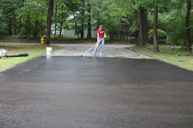 Safely drive on asphalt patch within one hour of application. How To Repair And Reseal A Driveway Diy Network