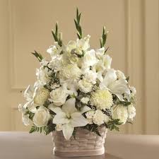 Hall's flower shop creates beautiful sympathy flowers designed for the viewing and funeral service. White Funeral Flowers In A Basket Ital Florist