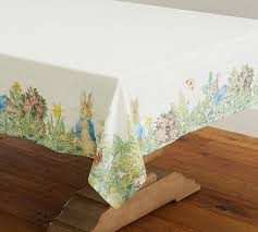 Easter bunny drawing a decorated easter egg. Spring Tablecloths That Will Complete Your Easter Sunday Tablescape Southern Living