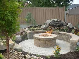 How to build a backyard firepit in 7 easy steps. Great Circular Paver Patio Kit With Large Round Outdoor Fire Pit And Do It Yourself Retaining Wall From Natural San Fire Pit Patio Backyard Fire Backyard Patio