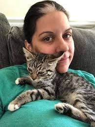 Adopted cat brings joy to family