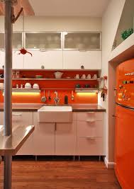 Using a spatula spread a second coat of the orange plaster across the backsplash area above the kitchen sink once the first. Dc Metro Sink Restoration Kitchen Industrial With Orange Fridge Fireclay Apron Exposed Pipes