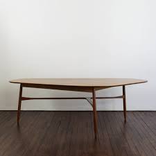(of a leaf or bean shape) resembling the shape of kidney coffee table a coffee table, also called a cocktail table, is a style of long, low table which is designed to be placed in front of a sofa, to support beverages (hence the name), magazines, feet, books (especially coffee table books), and other small items to be used while. Kidney Shaped Coffee Table By Svante Skogh 1950s 164393