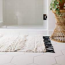 This master bath recreates the character of the farmhouse while adding all the modern amenities. Knot Weave Bath Mat Modern Bath Mat Bath Rugs Bathroom Floor Mat