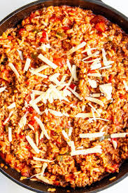 This simple, easy spanish rice and ground beef recipe makes a great 30 minute dinner, perfect for those nights when you need to get food on the table fast. Spanish Rice With Ground Beef Craving Home Cooked